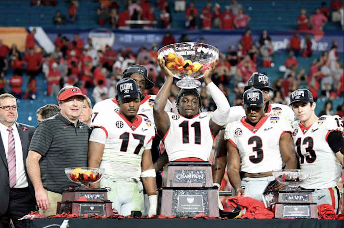 Georgia football players after defeating the Wolverines from the University of Michigan, 34-11, in the 2021 College Football Playoff semifinal game, played at the Orange Bowl, December 31, 2021, at Hard Rock Stadium in Miami Gardens, FL. Photo credit Perry McIntyre/UGA Sports Communications.